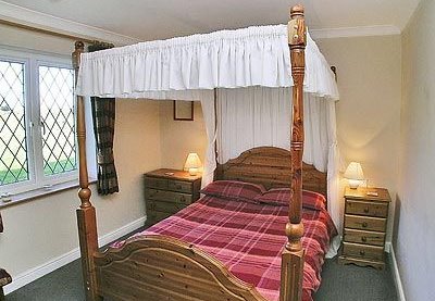Four poster bed at Bournestream self-catering accommodation